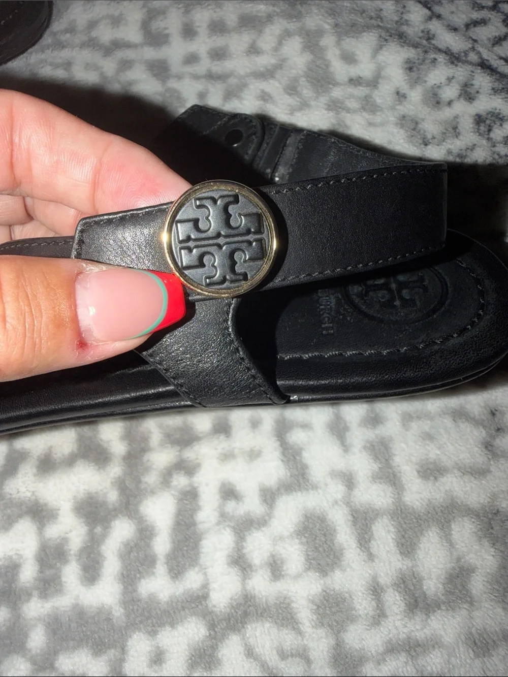 Tory Burch Black Leather Minnie travel sandal with gold accent
